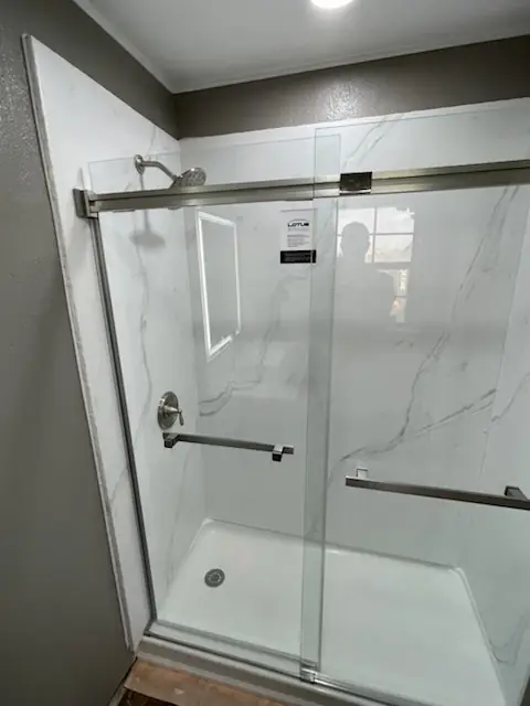 Shower with sliding glass door