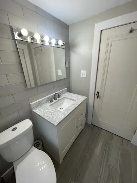New vanity and tile accent wall